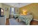 Charming bedroom featuring two twin beds, pineapple-themed decor, and soft natural light from the window at 627 Waterway Village Blvd. # 8E, Myrtle Beach, SC 29579