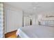 Well-lit bedroom with white furniture and hardwood floors, closet and access to bathroom at 627 Waterway Village Blvd. # 8E, Myrtle Beach, SC 29579