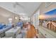 Open-concept living space connecting to a dining area and kitchen, filled with natural light and stylish decor at 627 Waterway Village Blvd. # 8E, Myrtle Beach, SC 29579