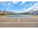 View of the community tennis court with basketball hoops, great for outdoor activities and staying active at 627 Waterway Village Blvd. # 8E, Myrtle Beach, SC 29579