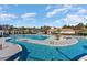 Resort style pool with lap lanes, lounge chairs, and immaculate landscaping at 7179 Shooting Star Way, Myrtle Beach, SC 29579