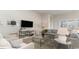 Comfortable living area with a gray sofa, stylish chairs, and a glass coffee table at 735 Rupert Dr, Conway, SC 29526