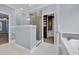 Elegant bathroom showcasing glass-enclosed shower and access to a large walk-in closet at 760 Carolina Farms Blvd., Myrtle Beach, SC 29579
