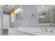Elegant bathroom with double sinks, modern fixtures, and a glass-enclosed shower at 760 Carolina Farms Blvd., Myrtle Beach, SC 29579