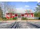 Exterior showcases a community clubhouse with inviting ramp access and charming architectural details, adding neighborhood appeal at 760 Carolina Farms Blvd., Myrtle Beach, SC 29579