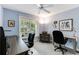 Inviting home office with views to a lovely screened porch for a relaxing workspace at 786 Wild Oak Ln. Nw, Calabash, NC 28467
