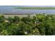 Expansive aerial view showcasing the lush greenery, bodies of water, and natural beauty at 951 Herriott Farms Dr., Georgetown, SC 29440