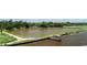 An aerial view of a coastal property featuring a dock extending into the water at 951 Herriott Farms Dr., Georgetown, SC 29440