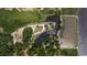 Aerial view showcasing the property's pond and landscaping at 951 Herriott Farms Dr., Georgetown, SC 29440