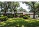 Charming brick home featuring manicured landscaping and a welcoming front entrance at 951 Herriott Farms Dr., Georgetown, SC 29440