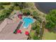 Expansive aerial view showcasing a private pool, patio, and lush landscaping at 9737 Catalonia Ct., Myrtle Beach, SC 29579