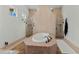 Luxury bathroom featuring a soaking tub with dual shower heads, tile floors and modern fixtures at 9737 Catalonia Ct., Myrtle Beach, SC 29579