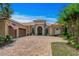Beautiful single-Gathering home with a well-maintained driveway and manicured landscaping at 9737 Catalonia Ct., Myrtle Beach, SC 29579