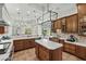 Updated kitchen with an island, custom cabinets, and modern fixtures at 9737 Catalonia Ct., Myrtle Beach, SC 29579