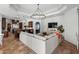 Open living space featuring an entertainment area with a large sofa and a modern chandelier at 9737 Catalonia Ct., Myrtle Beach, SC 29579