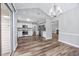 The bright dining room features direct access to the kitchen and a view of the living room at 100 St. Andrews Ln., Myrtle Beach, SC 29588