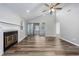 Spacious living room featuring a fireplace, vaulted ceiling, and hardwood floors at 100 St. Andrews Ln., Myrtle Beach, SC 29588