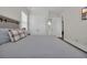 Bedroom view showing bedding details and access to the bathroom and walk-in closet at 1024 Pochard Dr., Conway, SC 29526