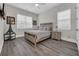 Well-lit bedroom featuring modern furnishings, neutral color palette, and comfortable bed at 1024 Pochard Dr., Conway, SC 29526