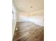 Bright bedroom featuring wood-look flooring and natural light from the window at 1025 Carolina Rd. # H4, Conway, SC 29526