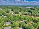 Aerial view of a property nestled among lush trees near a golf course at 103 Wofford Ln., Conway, SC 29526