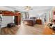 Well-lit bedroom with a bunk bed, a cozy queen bed, hardwood floors, and a bright window at 103 Wofford Ln., Conway, SC 29526