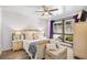 Serene bedroom featuring a rattan bed frame, natural light, and wood floors at 103 Wofford Ln., Conway, SC 29526