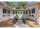 Inviting entrance with a double front door, flanked by matching windows and decorative seating areas at 103 Wofford Ln., Conway, SC 29526