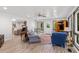 Airy living area connects seamlessly, showcasing hardwood flooring and inviting atmosphere at 103 Wofford Ln., Conway, SC 29526