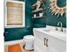 Chic powder room with white vanity, gold faucet, and elegant decor at 1072 Chelsey Circle, Conway, SC 29526