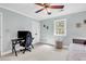 Cozy bedroom with ceiling fan, large window and desk at 1072 Chelsey Circle, Conway, SC 29526