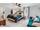 Spacious bedroom with a large bed, sitting area, and closet at 1072 Chelsey Circle, Conway, SC 29526