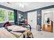 Bedroom with an ensuite bathroom, natural light and neutral colored walls at 1072 Chelsey Circle, Conway, SC 29526
