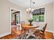 Cozy dining area with hardwood floors and natural light, perfect for intimate meals and gatherings at 1072 Chelsey Circle, Conway, SC 29526