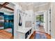 Hallway featuring built-in storage, a bench, and easy access to the kitchen and other living spaces at 1072 Chelsey Circle, Conway, SC 29526