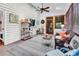 Inviting sunroom features vaulted ceilings, wood floors, and lots of natural light at 1072 Chelsey Circle, Conway, SC 29526