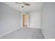 Bedroom with gray carpet, gray walls, white doors and trim, and a ceiling fan at 1120 Fairway Ln. # 1120, Conway, SC 29526