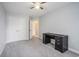 Bedroom with gray walls, gray carpet, a desk, white trim, and a ceiling fan at 1120 Fairway Ln. # 1120, Conway, SC 29526