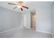 Bedroom with a ceiling fan, gray walls, plush carpeting, and white doors at 1120 Fairway Ln. # 1120, Conway, SC 29526