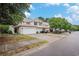 A row of townhomes, each featuring a white garage door and well-maintained lawns, offering comfortable community living at 1120 Fairway Ln. # 1120, Conway, SC 29526