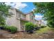Exterior view of a home with light siding, manicured bushes, and a neatly maintained lawn at 1120 Fairway Ln. # 1120, Conway, SC 29526