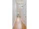 Bright foyer featuring hardwood floors, a staircase, and a high ceiling with windows at 1120 Fairway Ln. # 1120, Conway, SC 29526