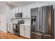 Modern kitchen featuring stainless steel appliances, ample white cabinetry, and sleek countertops at 1120 Fairway Ln. # 1120, Conway, SC 29526