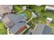 Aerial shot showcasing the property layout with its solar panels, backyard, sheds, patio, and fencing at 1145 Forest Dr., North Myrtle Beach, SC 29582