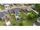 Aerial view of the property showcasing the backyard, storage, patio, and surrounding neighborhood at 1145 Forest Dr., North Myrtle Beach, SC 29582