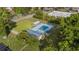 Overhead view of the community pool with lounge chairs, sun shelters, and surrounding greenery at 1145 Forest Dr., North Myrtle Beach, SC 29582