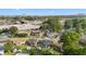 Aerial view featuring a neighborhood street with homes, landscaping, and the property's fenced backyard at 1145 Forest Dr., North Myrtle Beach, SC 29582