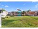 Spacious backyard with a patio, picnic table, and hammock, perfect for outdoor relaxation and entertainment at 1145 Forest Dr., North Myrtle Beach, SC 29582