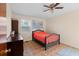 Comfortable bedroom with natural light, ceiling fan, and neutral decor at 1145 Forest Dr., North Myrtle Beach, SC 29582