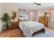 This spacious bedroom features calming decor, two windows and a ceiling fan at 1145 Forest Dr., North Myrtle Beach, SC 29582